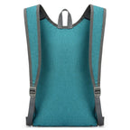 Teal backpack with gray straps on a white background