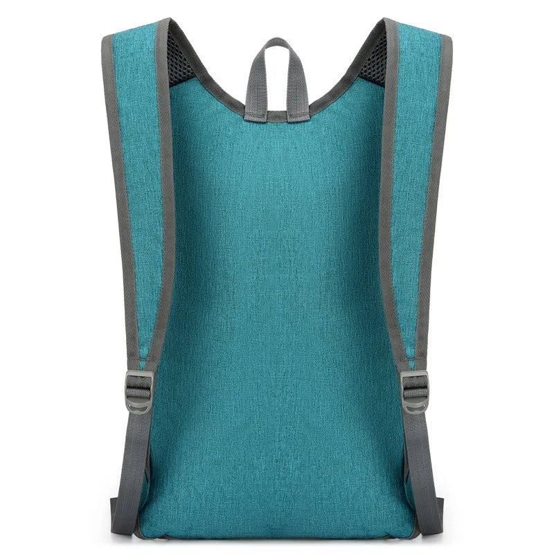 Teal backpack with gray straps on a white background