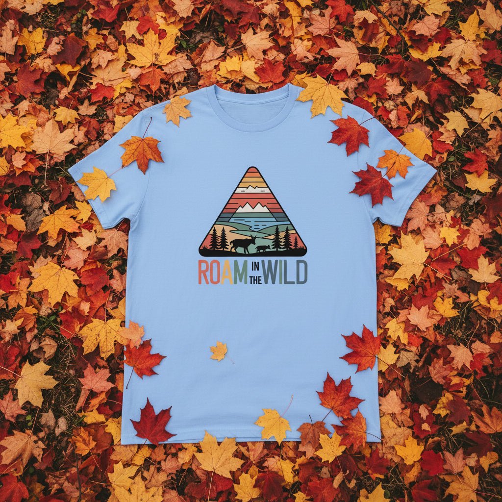 Light blue graphic t-shirt with triangular Roam the Wild front print