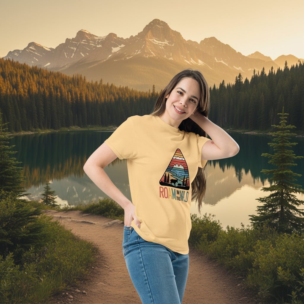 Yellow adventure T-shirt with triangle “Roam the Wild” landscape graphic