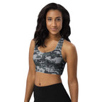Longline sports bra with dark digital camo, racerback neckline and wide hem