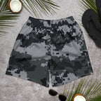 Digital camo athletic long shorts laid flat, elastic waistband, dark gray and black