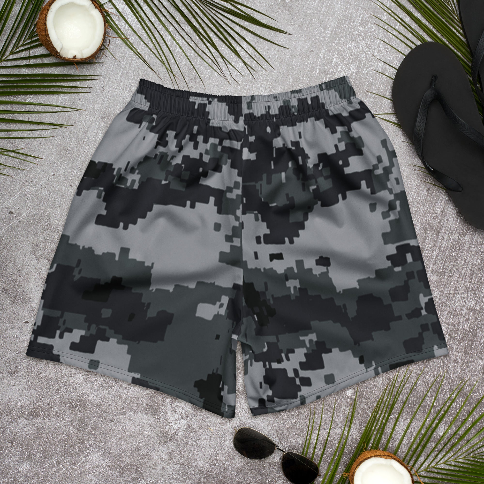 Digital camo athletic long shorts laid flat, elastic waistband, dark gray and black