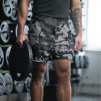 Digital camo athletic long shorts on model, elastic waistband, dark gray and black