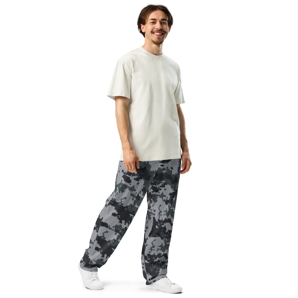 Front view of digital camouflage wide-leg joggers with relaxed straight legs