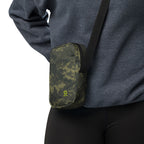 Digital camo crossbody bag on arm with black strap and small logo emblem