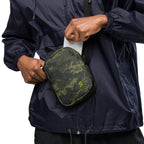 Digital camo messenger crossbody bag with front panel zipper and compact shape.