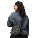 Digital camo crossbody bag worn on shoulder with black strap and front pocket