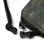 Digital camo crossbody bag with black webbing strap, zipper pulls, and hook-and-loop tab.