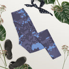 Navy digital camouflage yoga leggings laid flat with full-length legs and waistband
