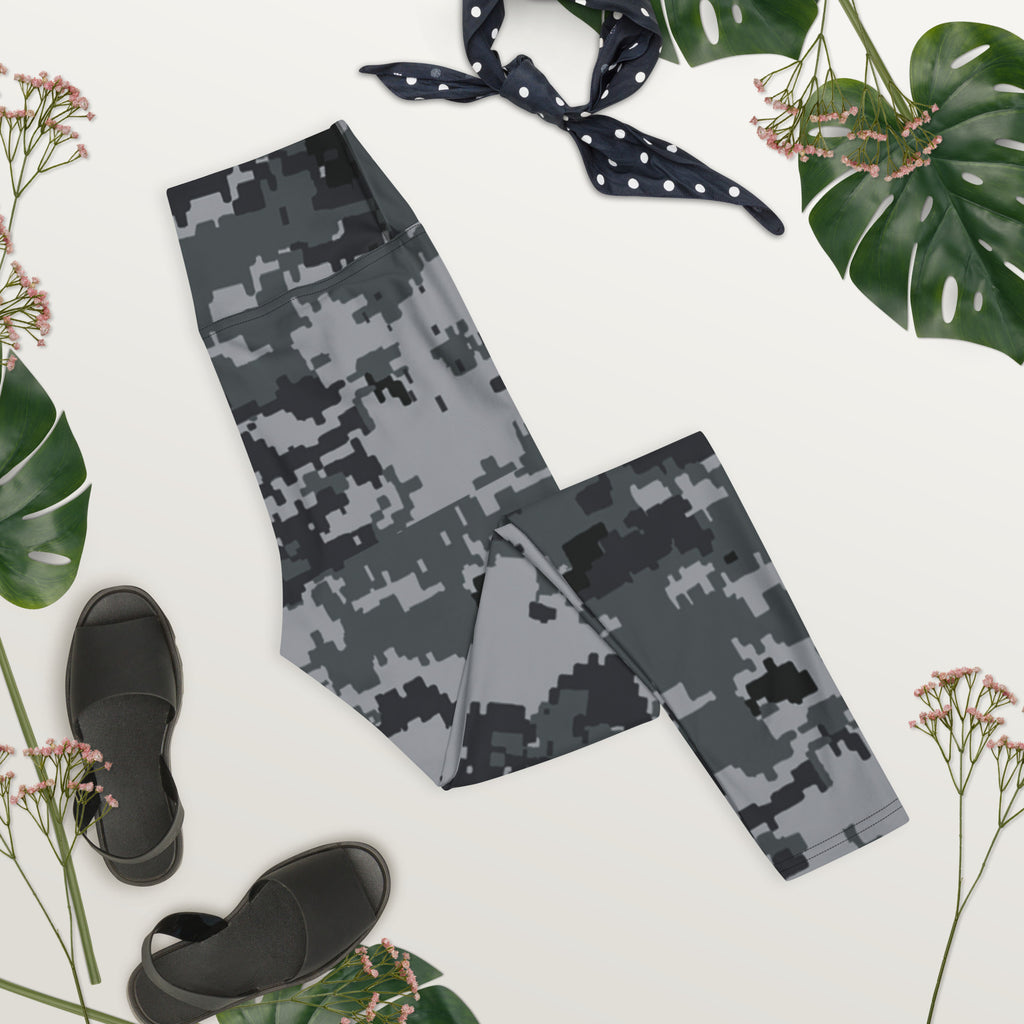 Digital camo leggings laid flat, full length with elastic waistband