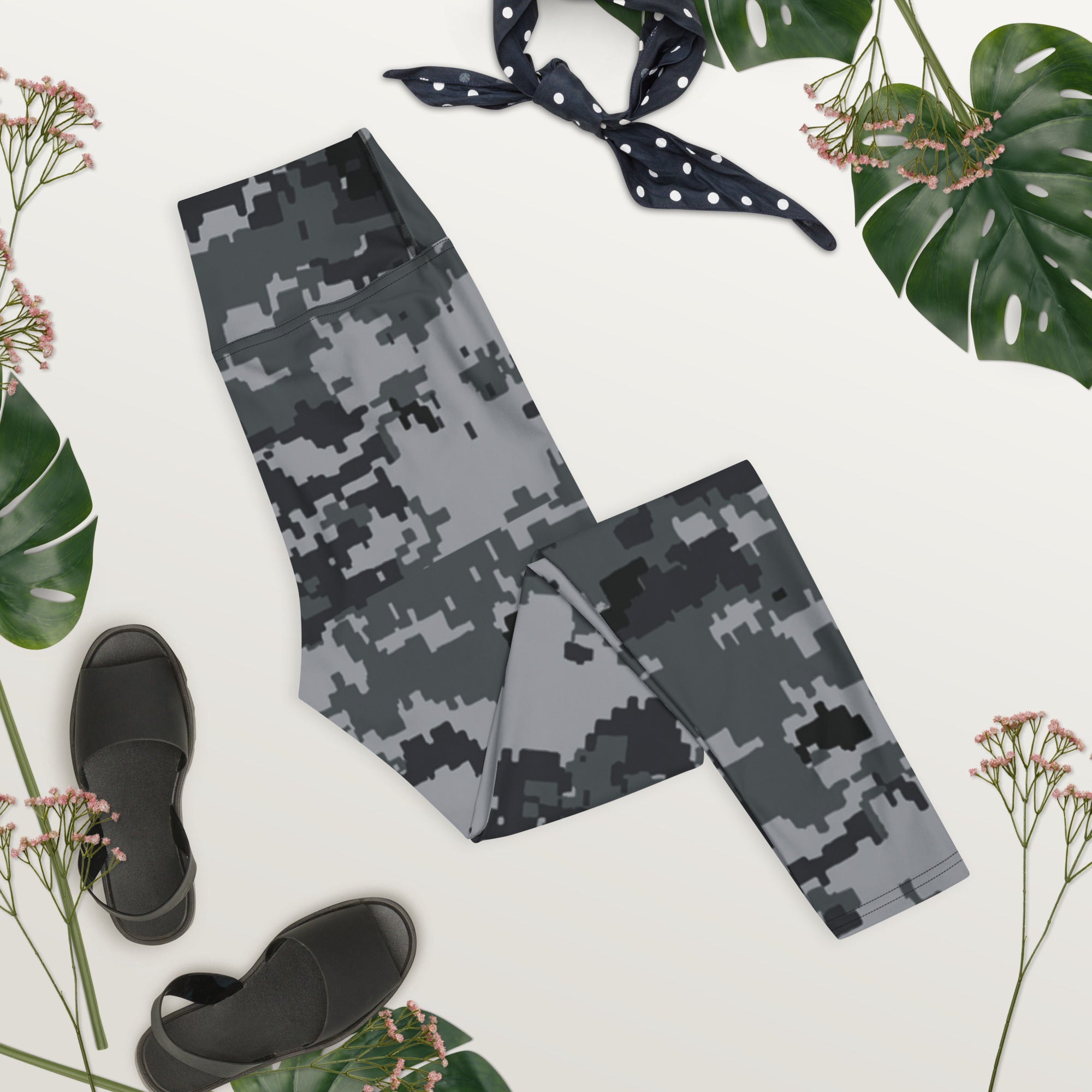 Digital camo leggings laid flat, full length with elastic waistband