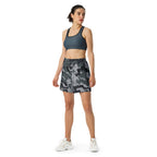 Digital camo athletic long shorts with elastic waistband, worn with a sports bra