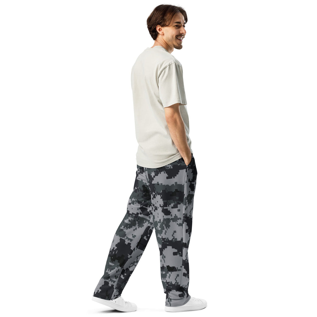 Side view of wide-leg joggers with digital camo pattern and elastic waistband.