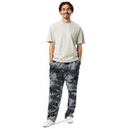 Men's wide-leg joggers in digital camouflage print, elastic waist and side pockets.