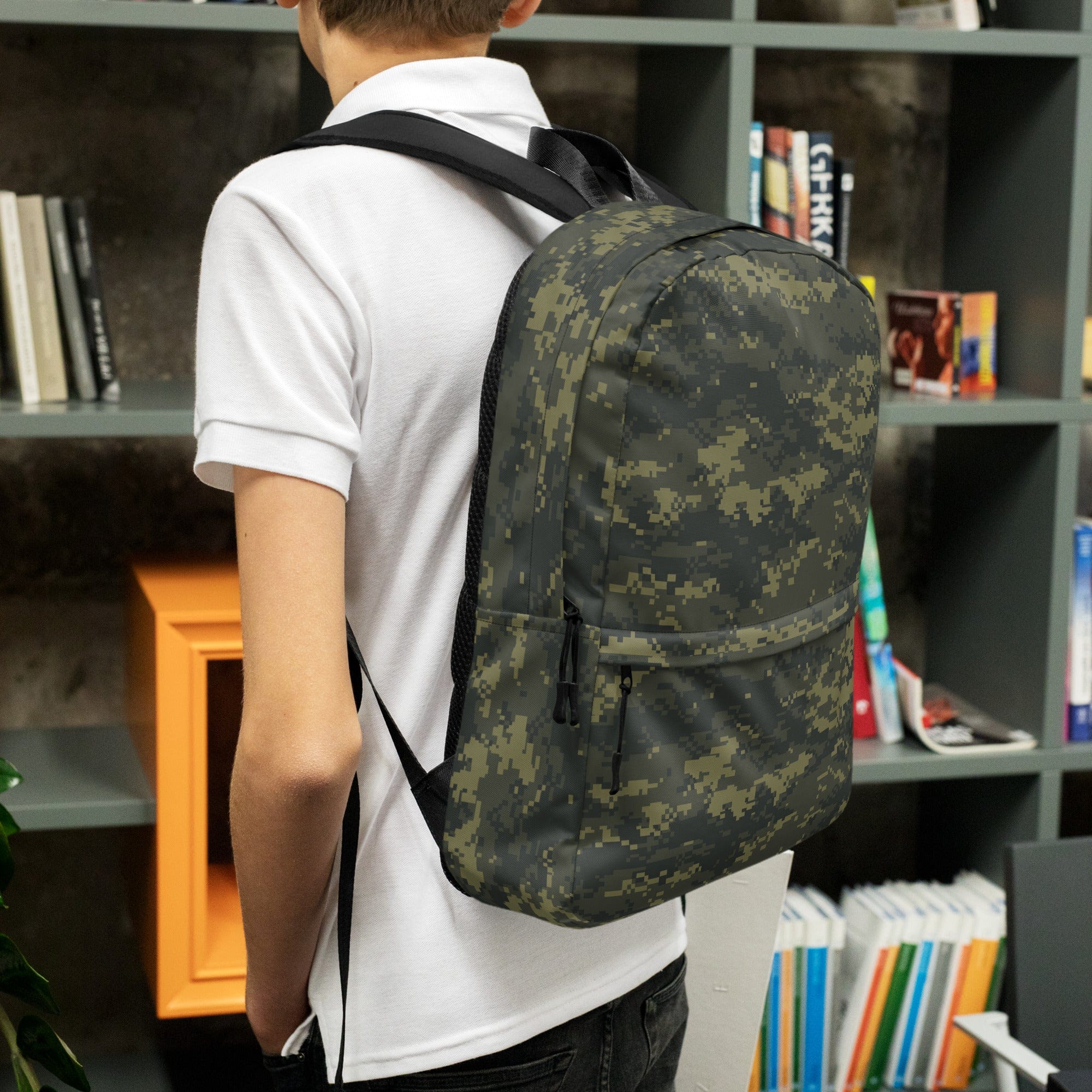 Camouflage backpack worn from the back with shoulder straps and front pocket.