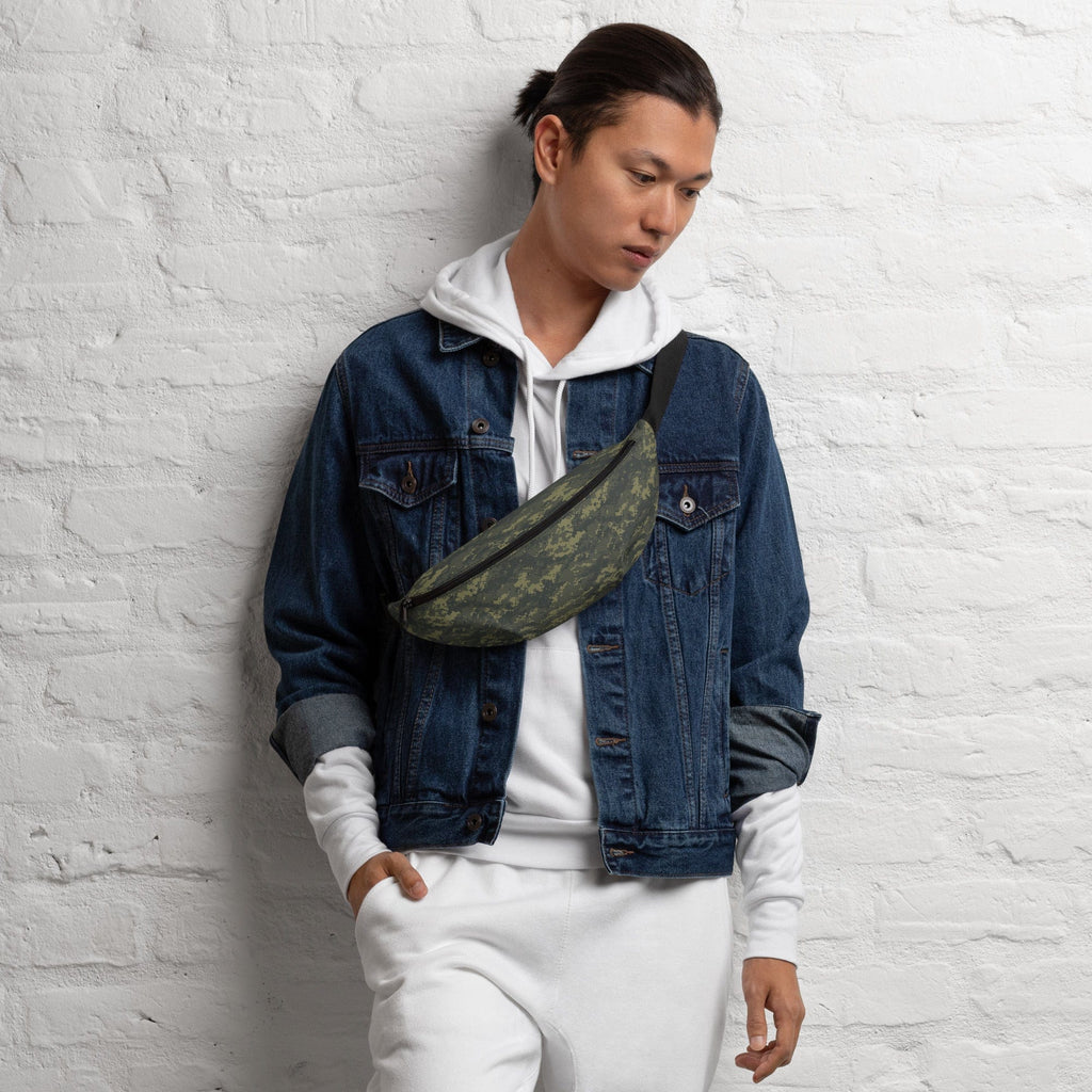 Camouflage waist bag with black strap and zippered pocket on dark jacket