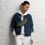 Camouflage waist bag with black strap and zippered pocket on dark jacket