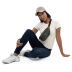 Camouflage fanny pack worn crossbody with adjustable black strap
