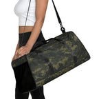 Camo green duffle bag with black shoulder strap and zippered end compartment