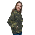 Camouflage hoodie on model in side profile; pullover hood with black drawstrings