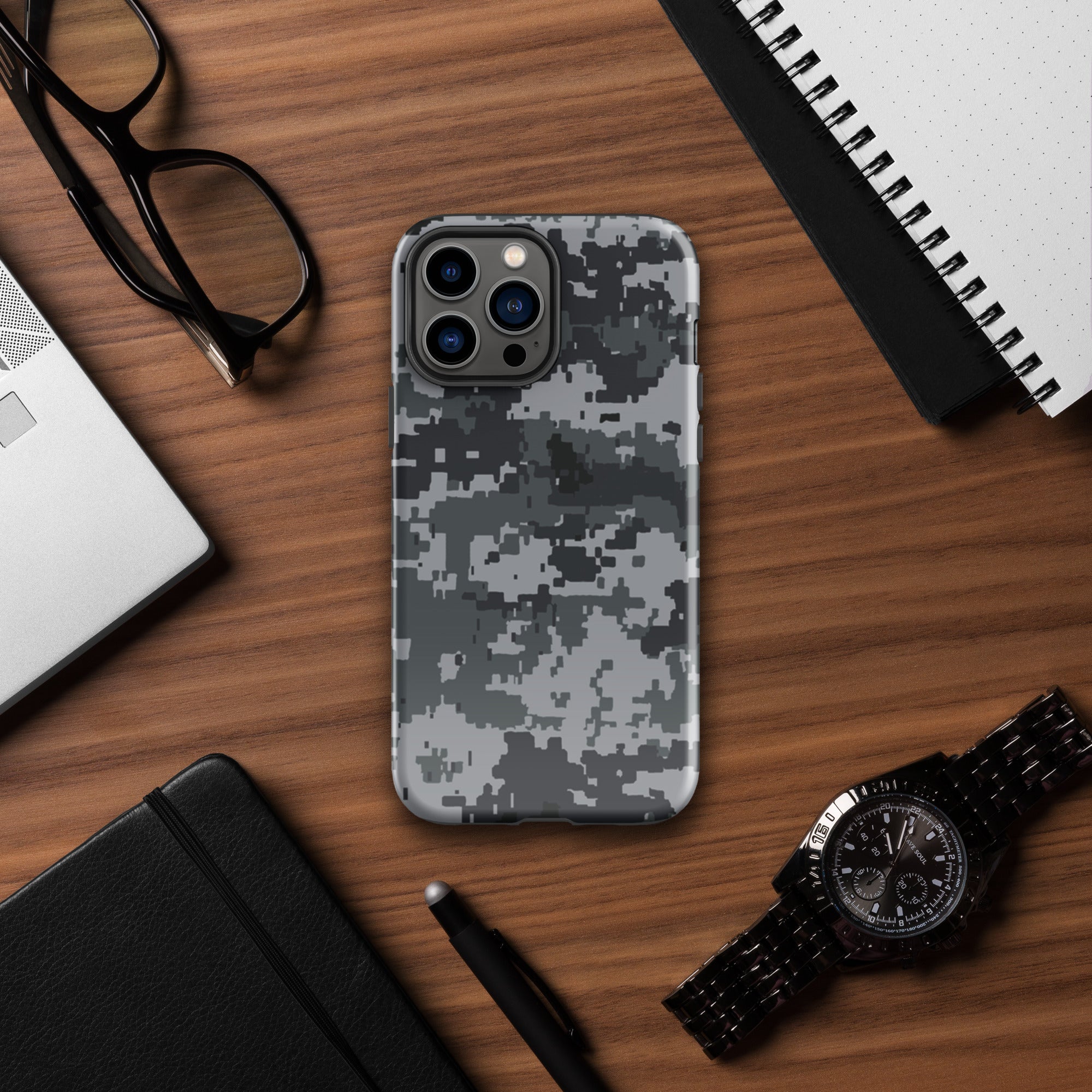 Gray digital camo iPhone case with rugged hard cover and raised multi-camera cutouts