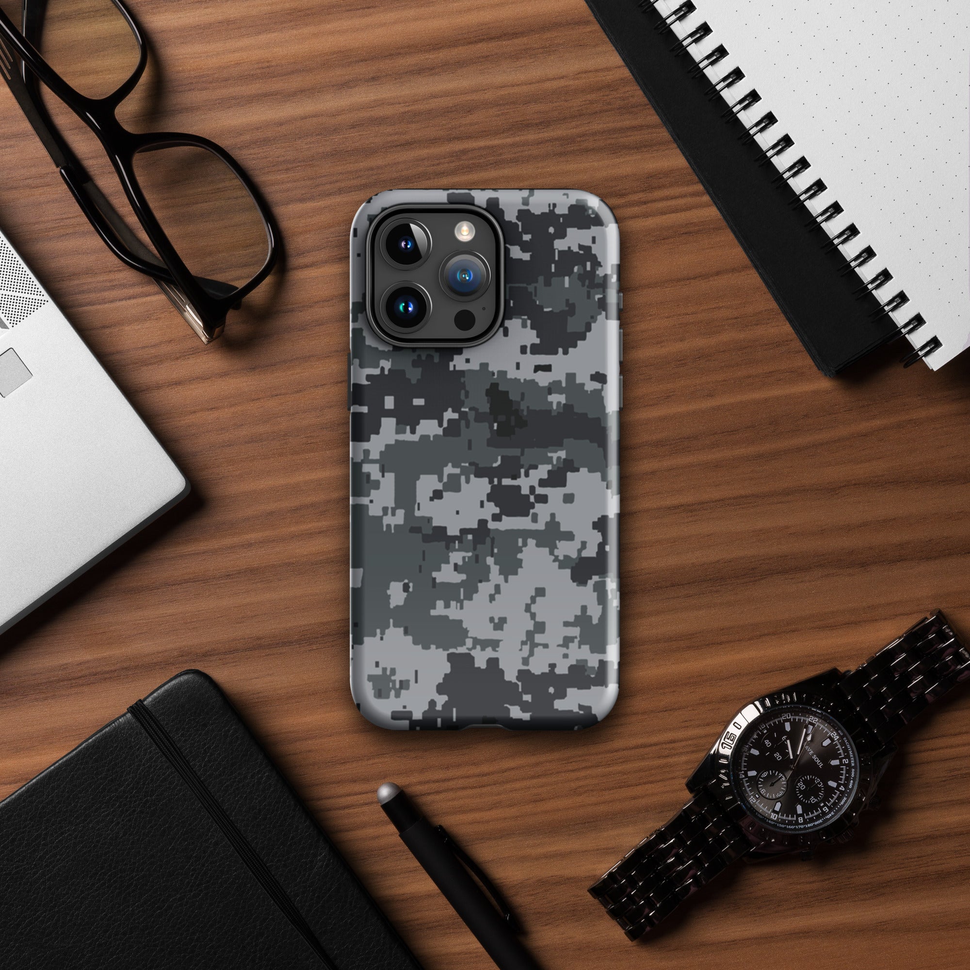 Gray digital camo iPhone tough case with triple-lens camera cutouts and raised rim