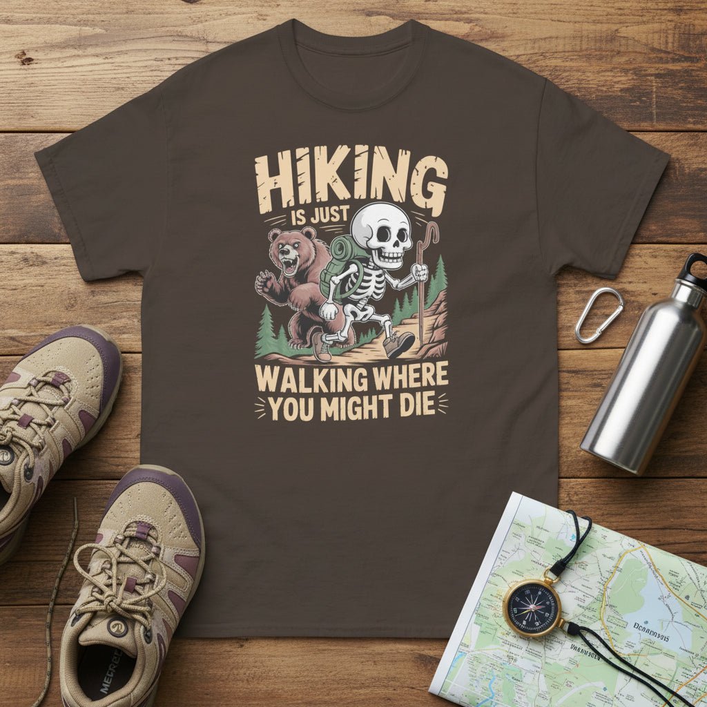 Charcoal graphic hiking T-shirt with skull-and-bear cartoon and slogan text.