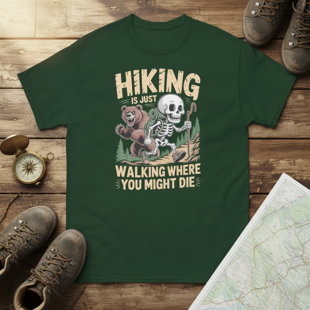 Forest green graphic hiking T-shirt with skull-and-bear cartoon and slogan text.