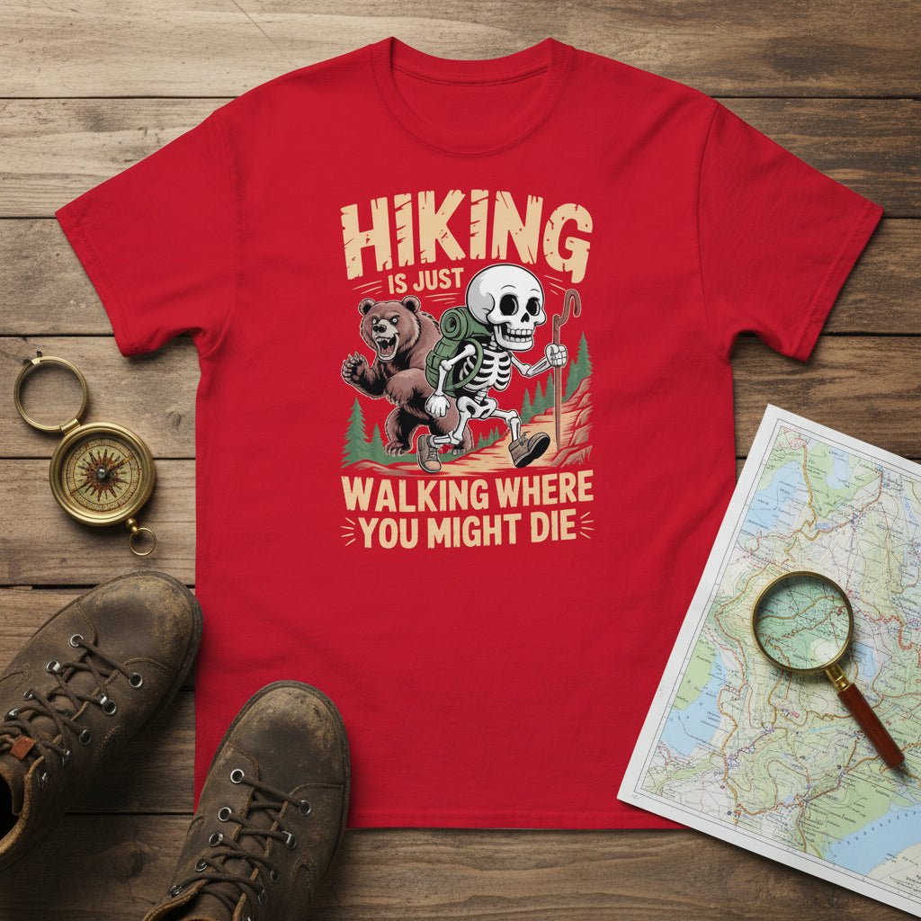 Red graphic hiking T-shirt with skull-and-bear cartoon and slogan text.