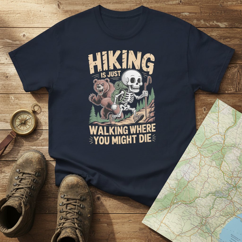 Dark blue hiking T-shirt with skull-and-forest front graphic and text 'Walking where you might die'