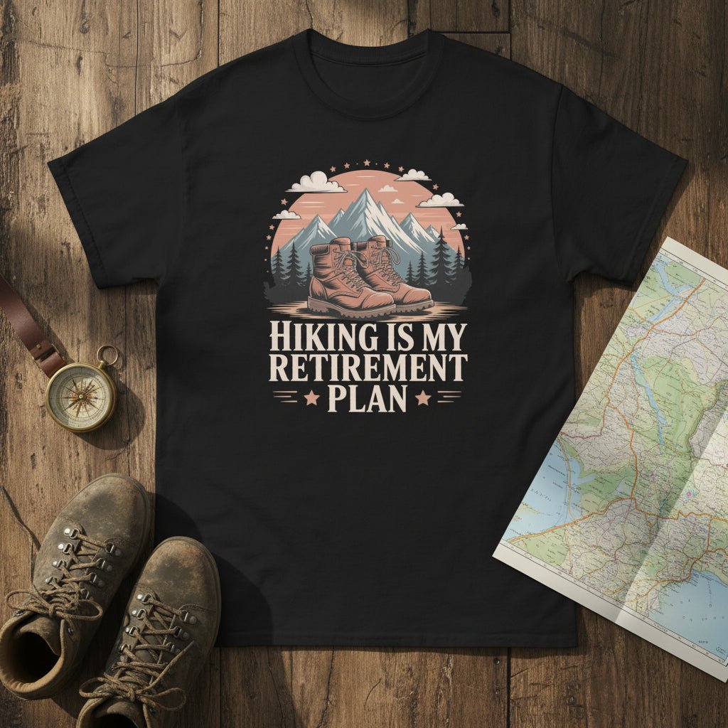 Black hiking T-shirt with mountain-and-boots logo and “Hiking is my retirement plan” text.