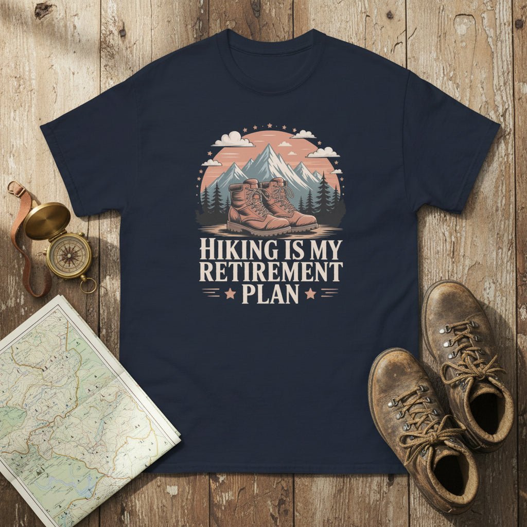 Navy hiking T-shirt with mountain-and-boots logo and “Hiking is my retirement plan” text.