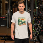 White camping T-shirt on model with front graphic campsite and 'Pitch It' text