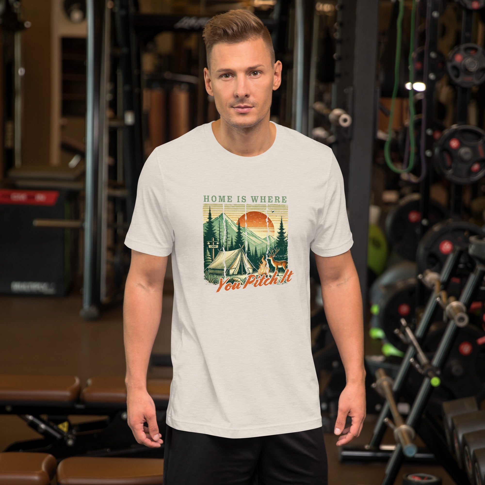 White camping T-shirt on model with front graphic campsite and 'Pitch It' text