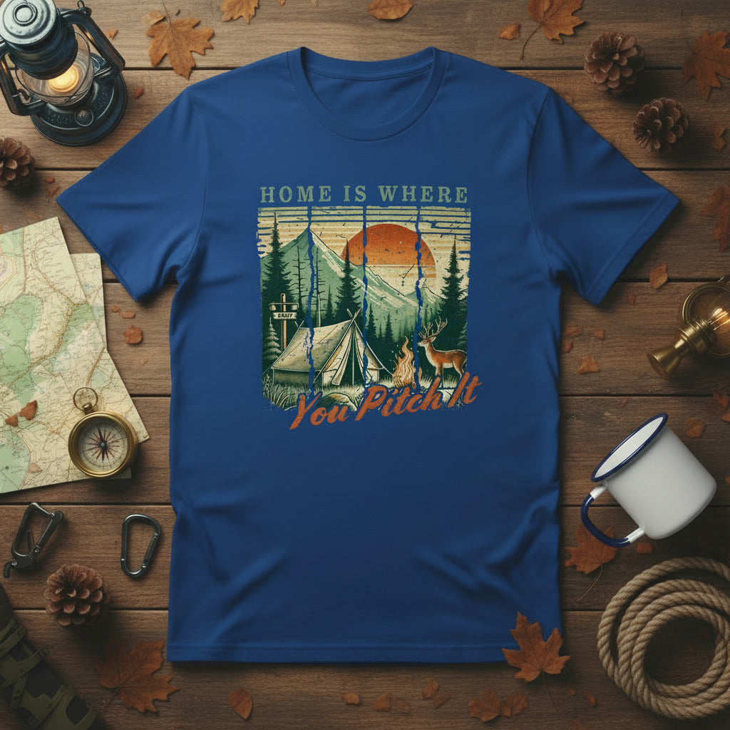 Royal blue camping T-shirt with tent and pine trees graphic and “Home is where” text