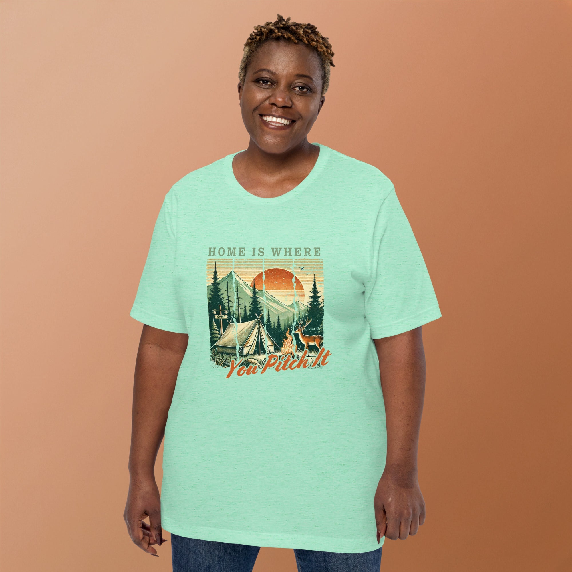 Mint green camping T-shirt on model with front graphic campsite and 'Pitch It' text
