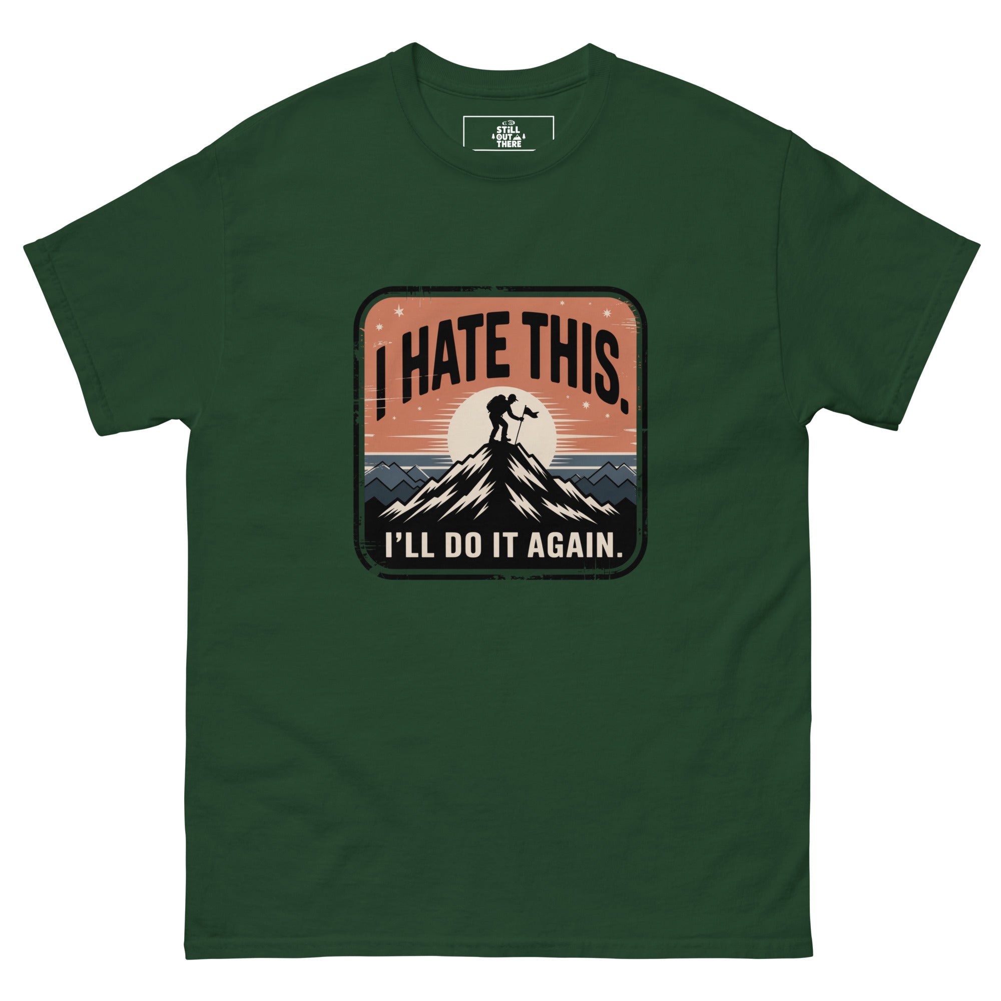 Forest green hiking t-shirt with mountain graphic and text 'I HATE THIS'/'I'LL DO IT AGAIN'.