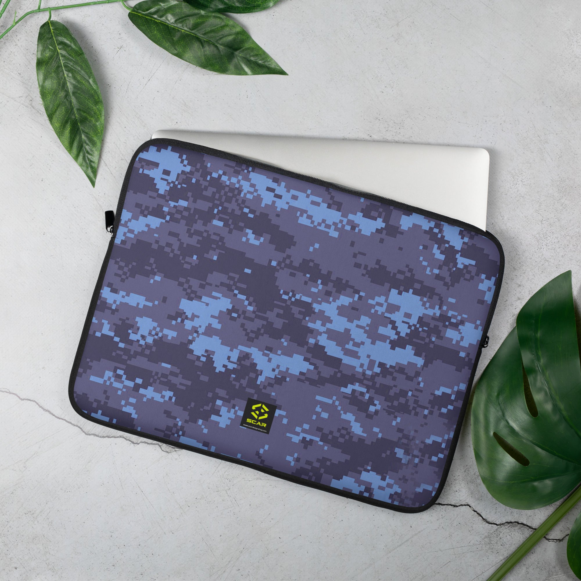 Blue and purple pixel camo laptop sleeve with zipper and black edge trim