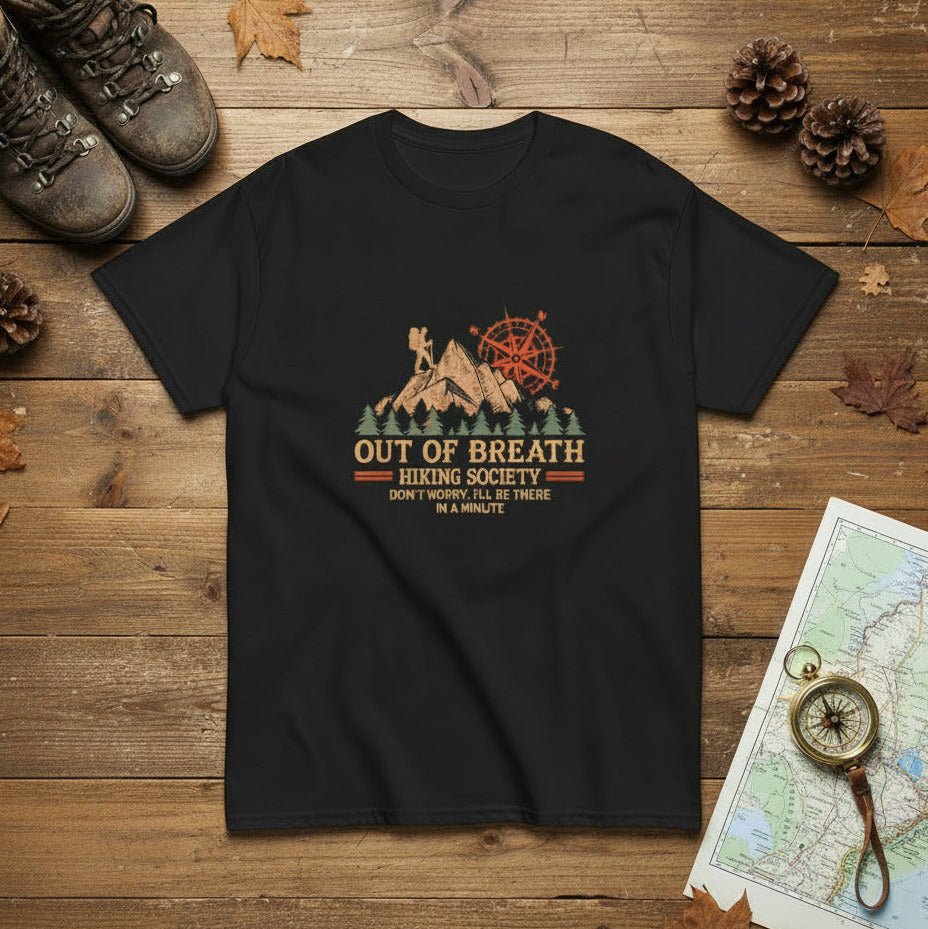 Black hiking graphic T-shirt with mountain cabin and compass emblem, crew neck