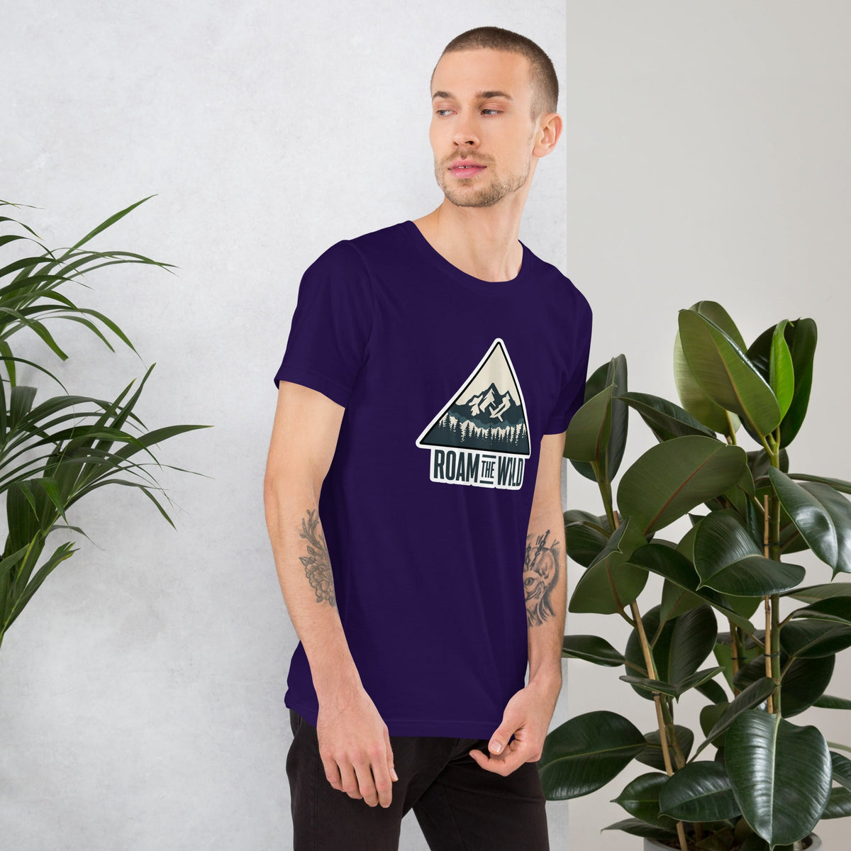 Purple unisex hiking T-shirt with Roam the Wild mountain logo graphic on chest