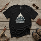 Black unisex t-shirt with “Roam the Wild” mountain logo in a triangular frame