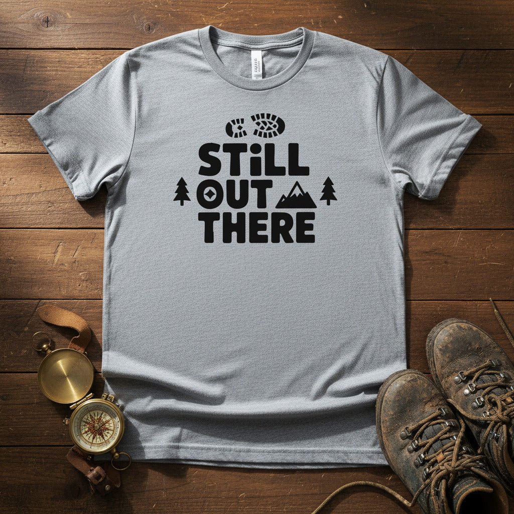 Sport gray hiking T-shirt with black 'Still Out There' logo and tree graphic