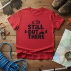 Red hiking T-shirt with black 'Still Out There' logo and tree graphic