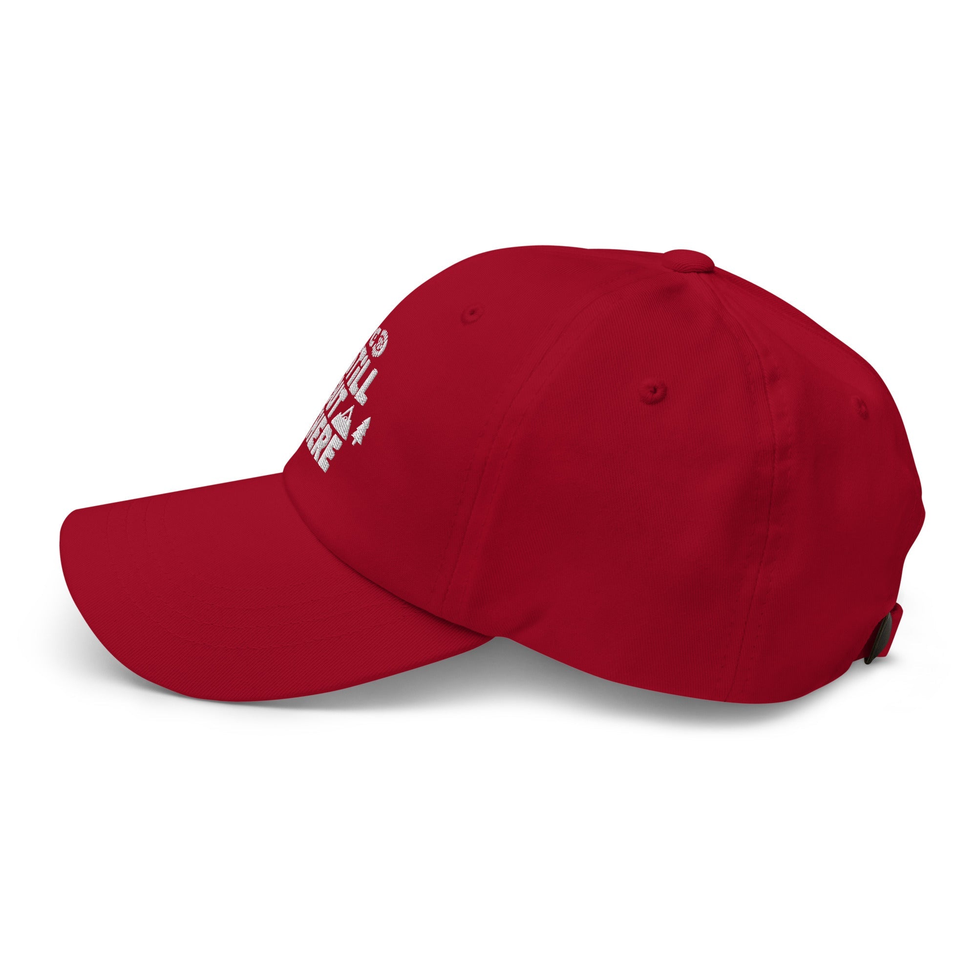 Red dad hat with white embroidered “Still Out There” logo and curved brim