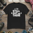 Black hiking T-shirt with white 'Still Out There' logo graphic on chest