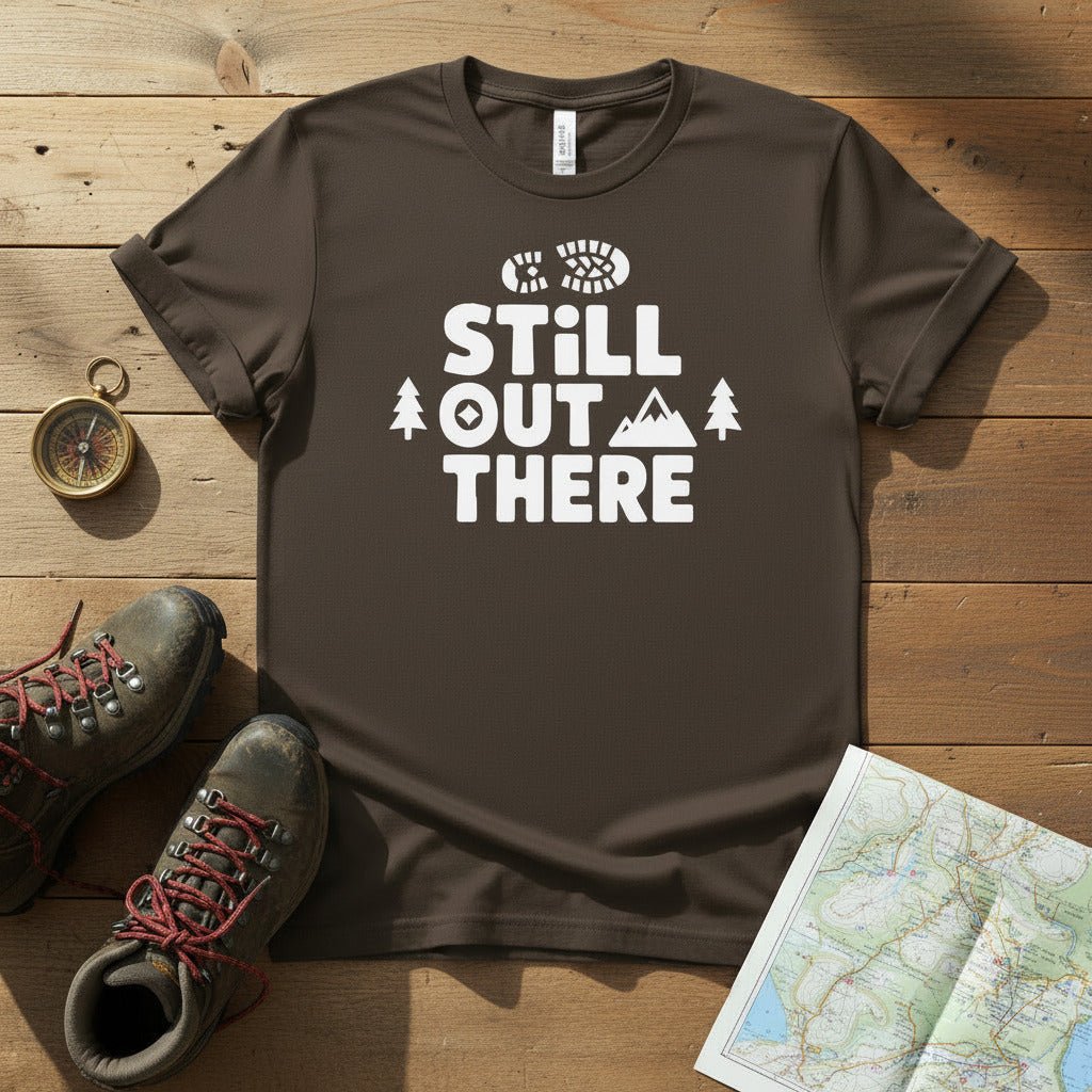 Hiking T-shirt, dark gray with white “Still Out There” logo and tree graphics