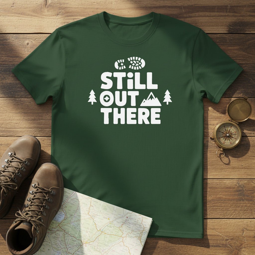 Hiking T-shirt, green with white “Still Out There” logo and tree graphics