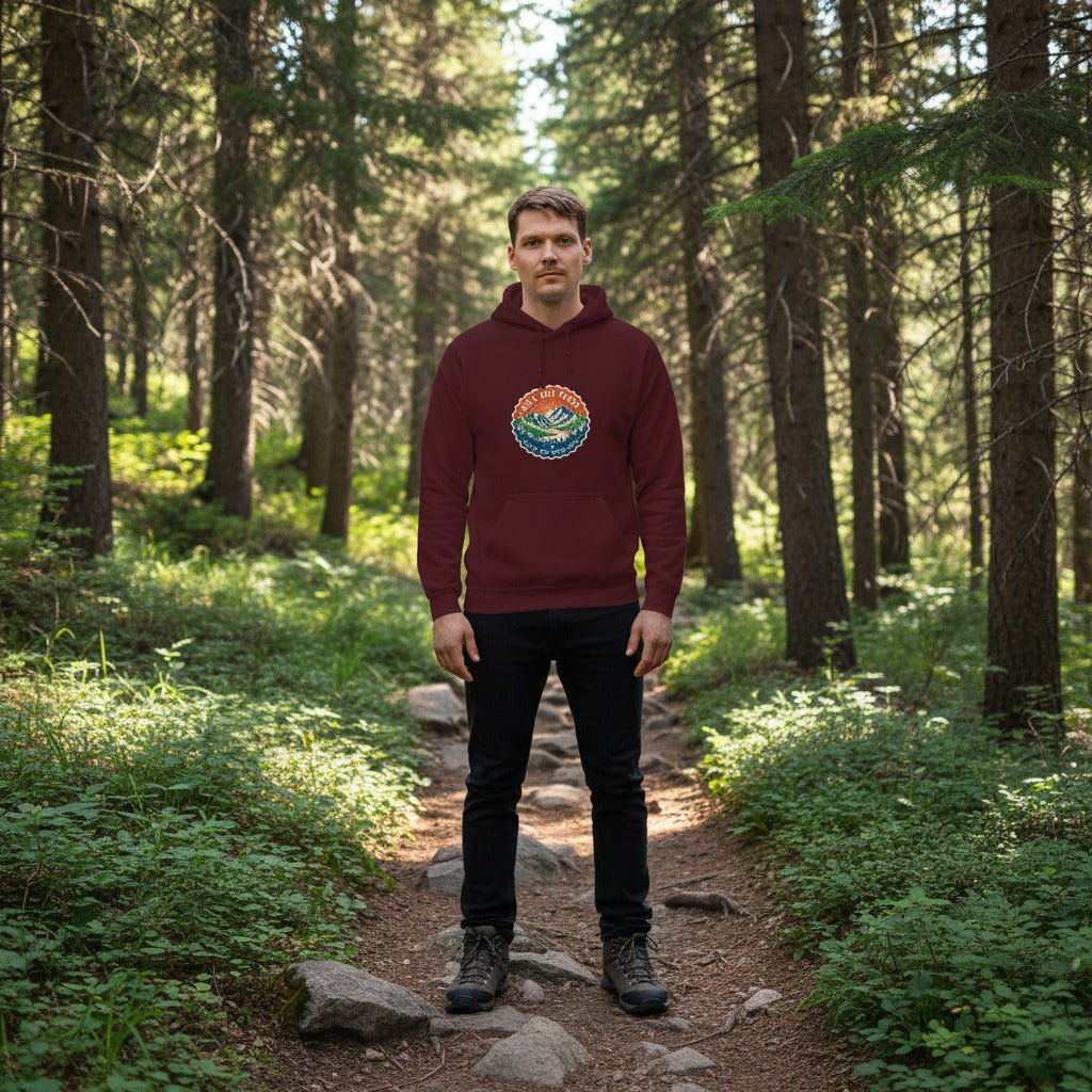 Maroon vintage-style mountain hoodie with front pocket and hood, colorful chest logo