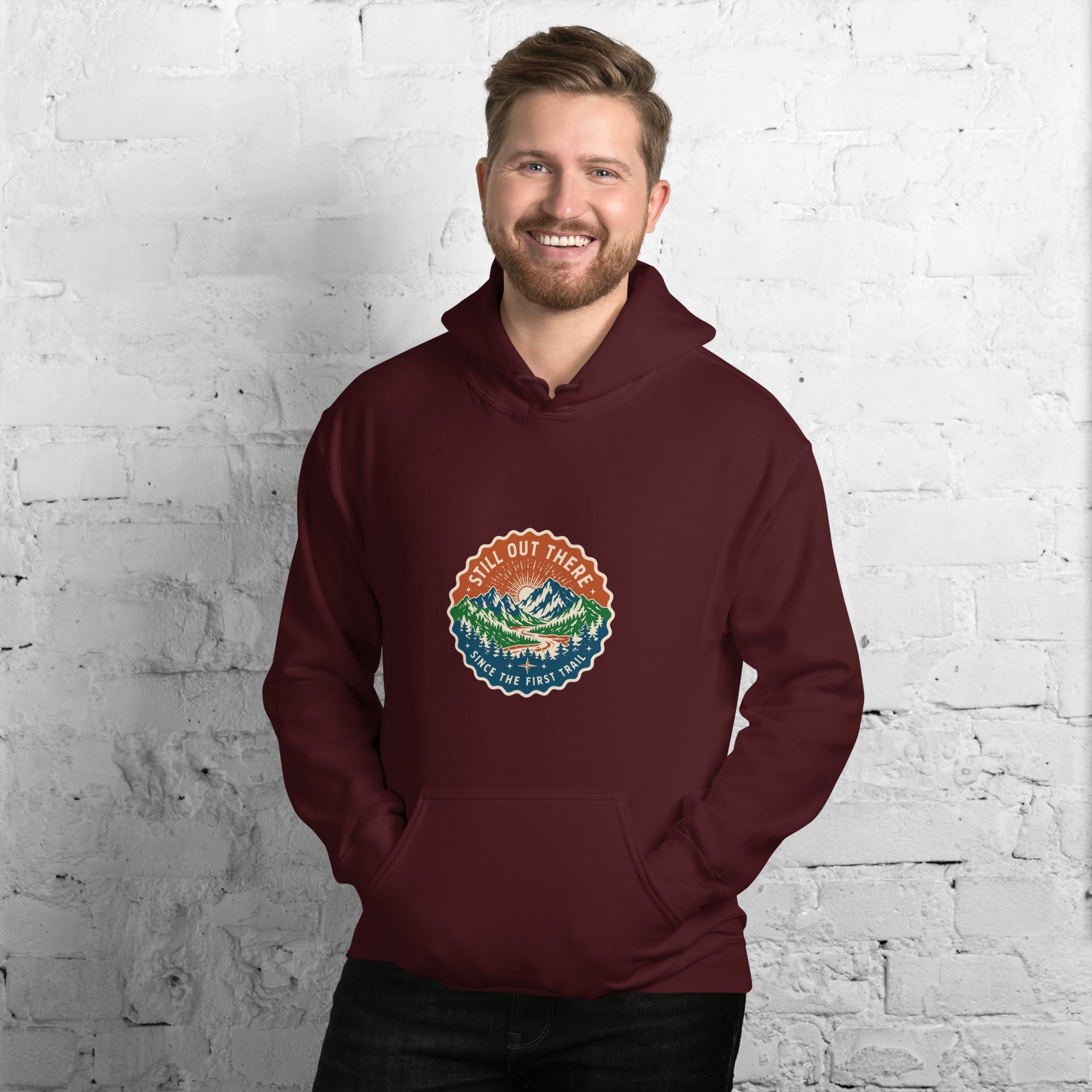 Maroon vintage-style mountain hoodie with hood, front pocket, and front logo patch